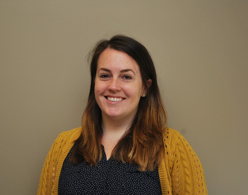 Lisa Quinn in yellow sweater