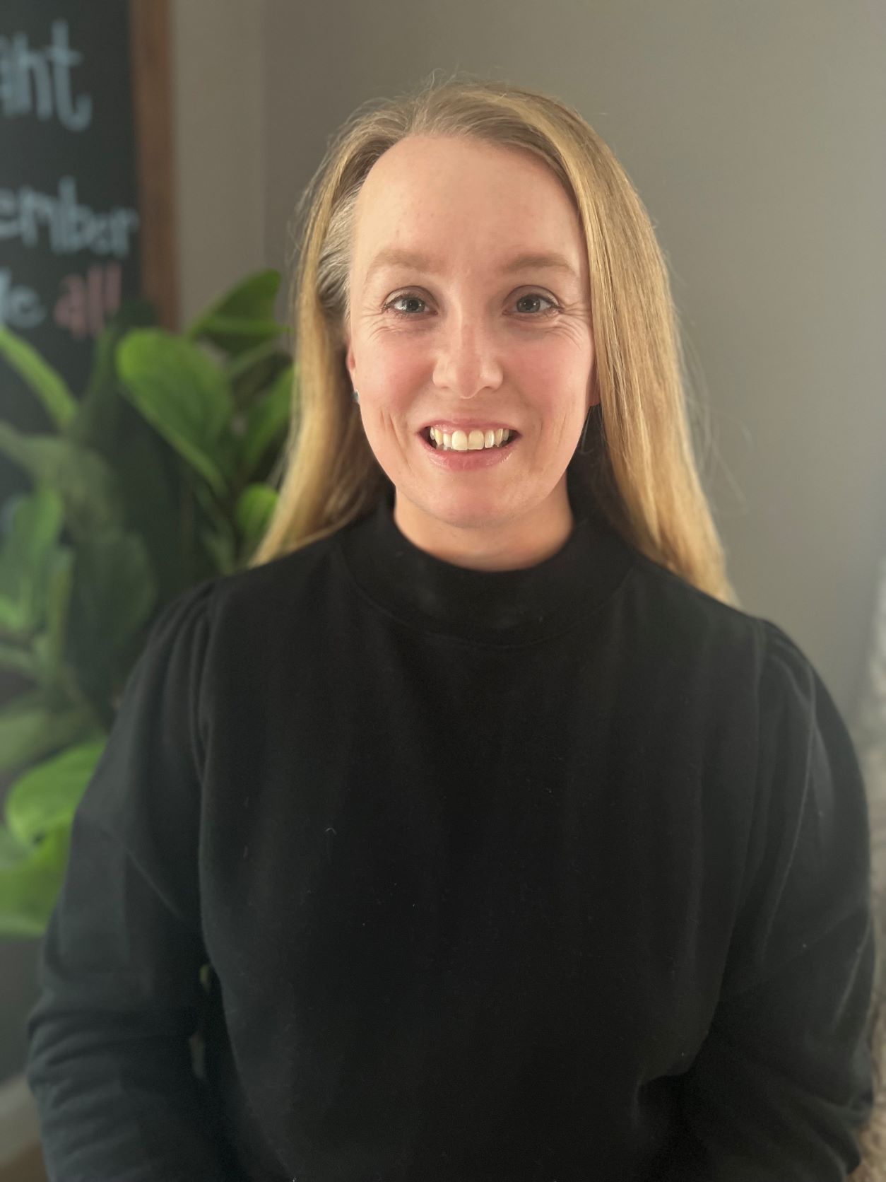 Caitlin Riley in black shirt