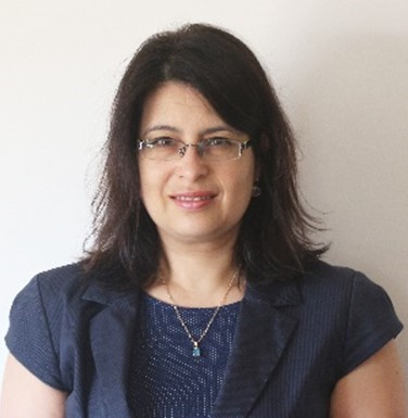 Anna Zisberg in blue top