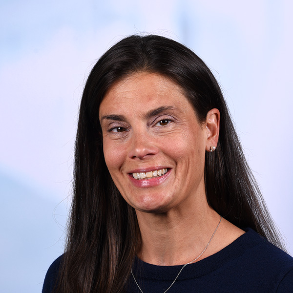 megan has dark brown straight hair past her shoulders