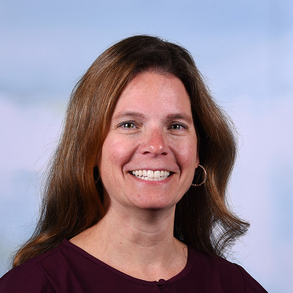 kathy has reddish brown hair