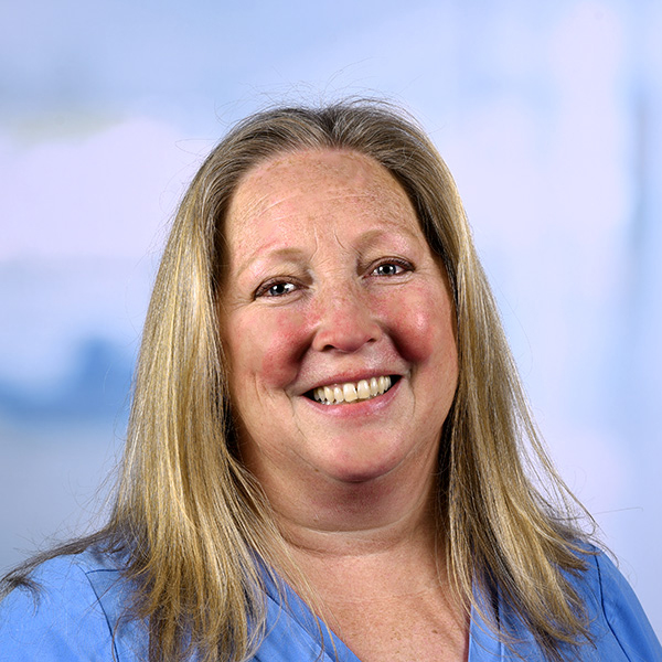 kristen has blonde hair and freckles 