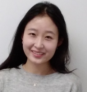 Jenny Hwang in grey sweater