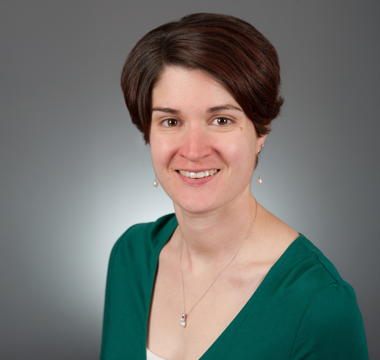 Ann Seman in green shirt