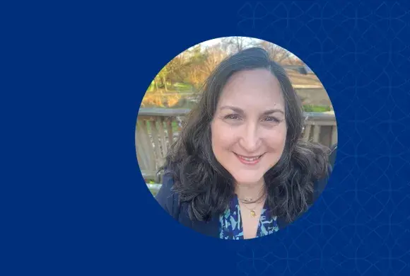 nicole is outside on a deck in the fall 