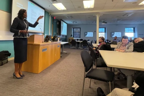 Woman talking to group 