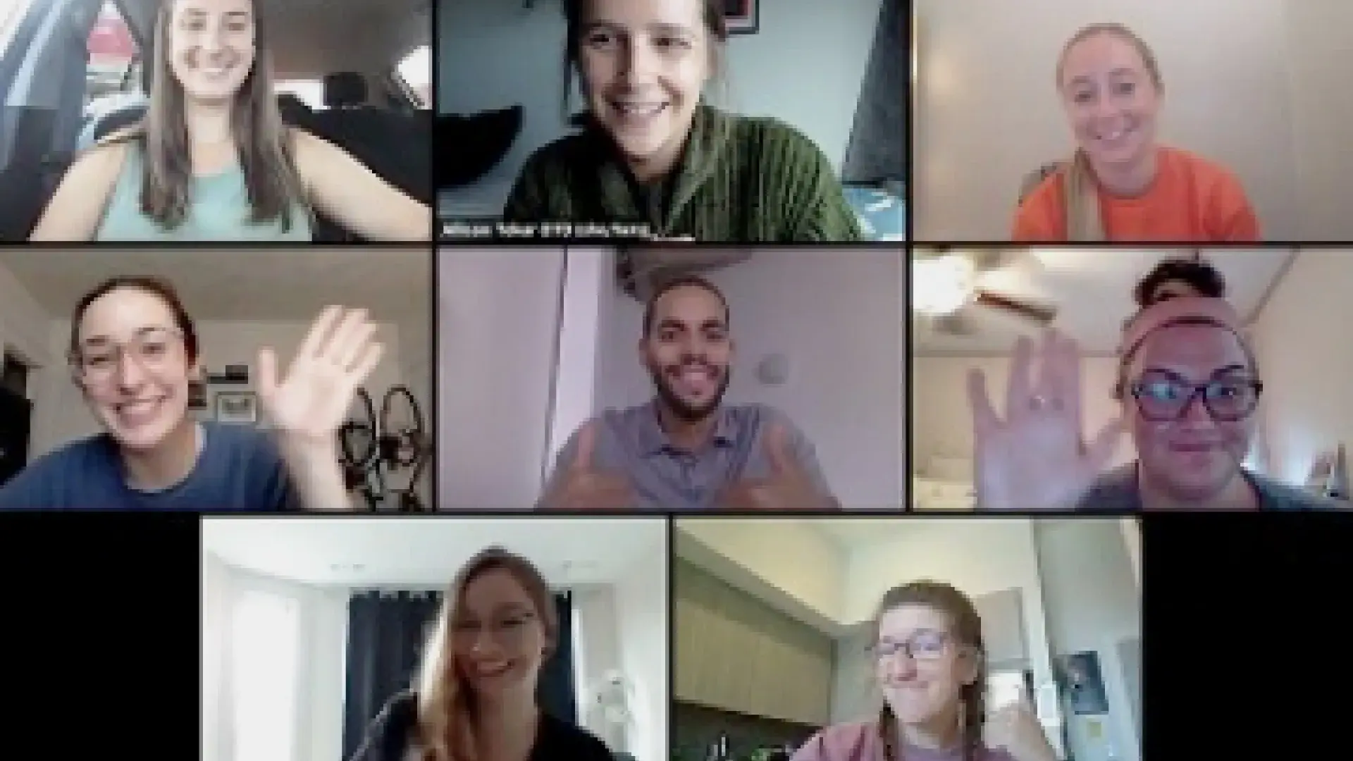 Eight people on a zoom call.