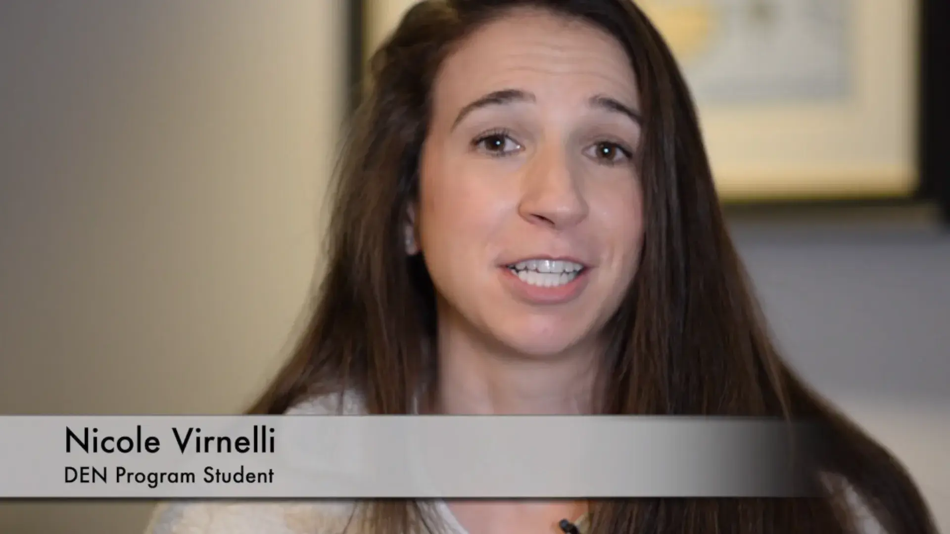 female student speaks to camera