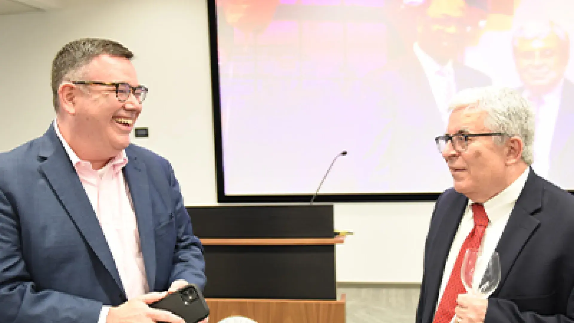 Dean of Student Services Jack Gormley sharing a laugh with Alex Johnson during “Celebrating the Legacy of Alex Johnson” event.​​​​​​