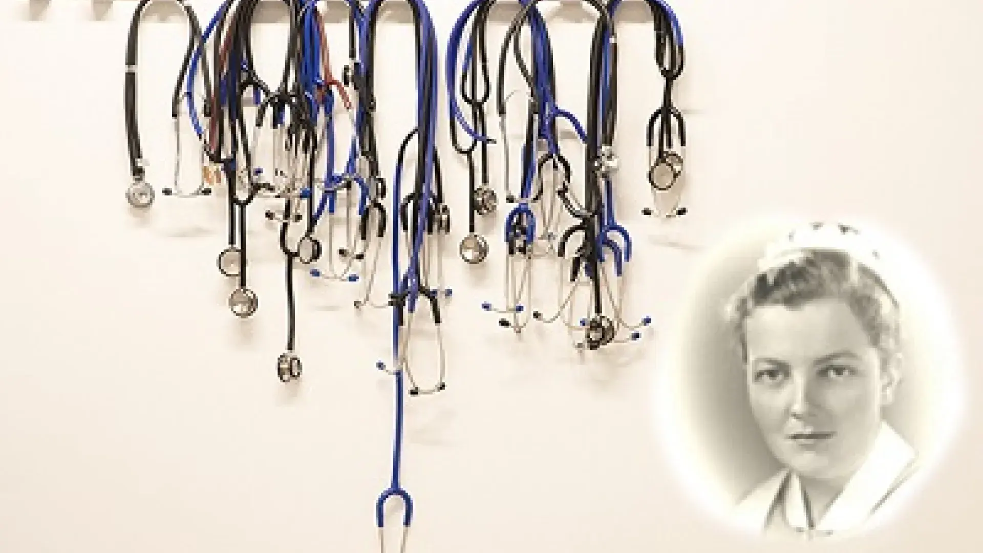 faded photo of ruth in her nursing uniform over a bunch of hanging stethoscopes