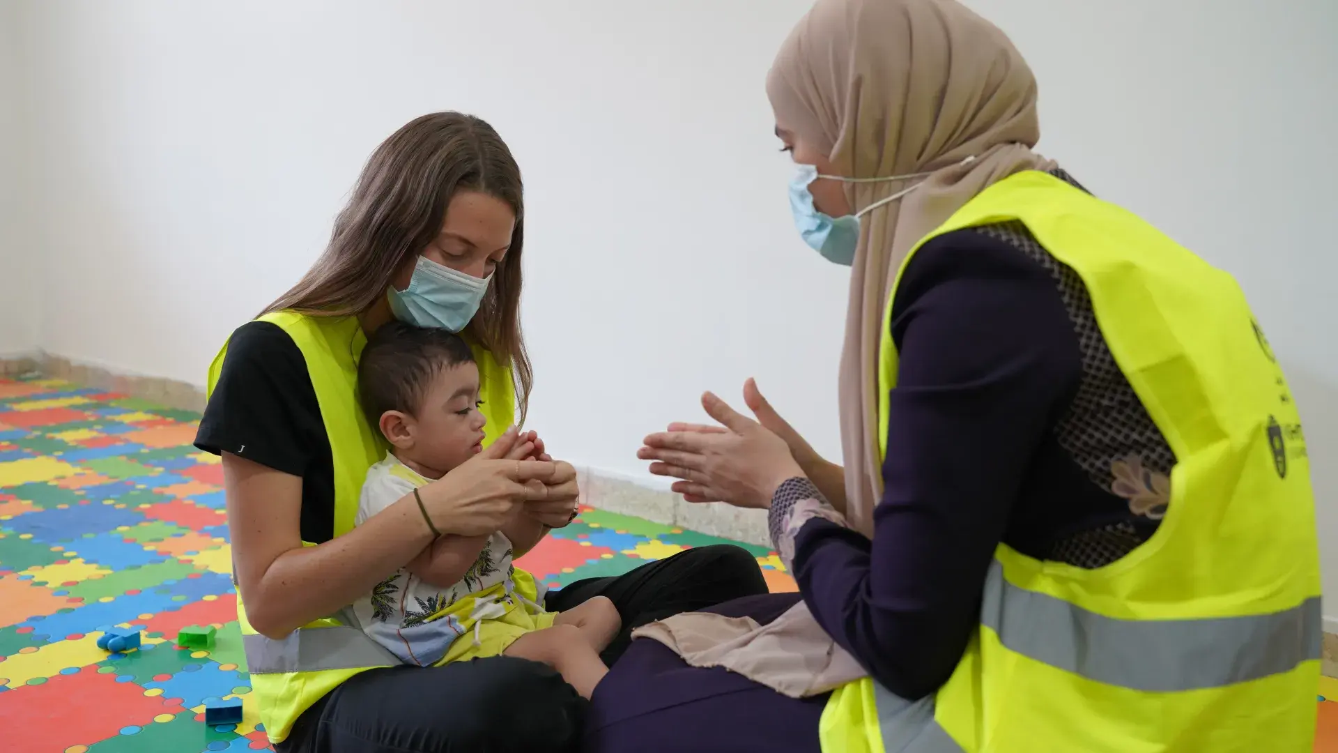 Ashley with Colleague & Child 