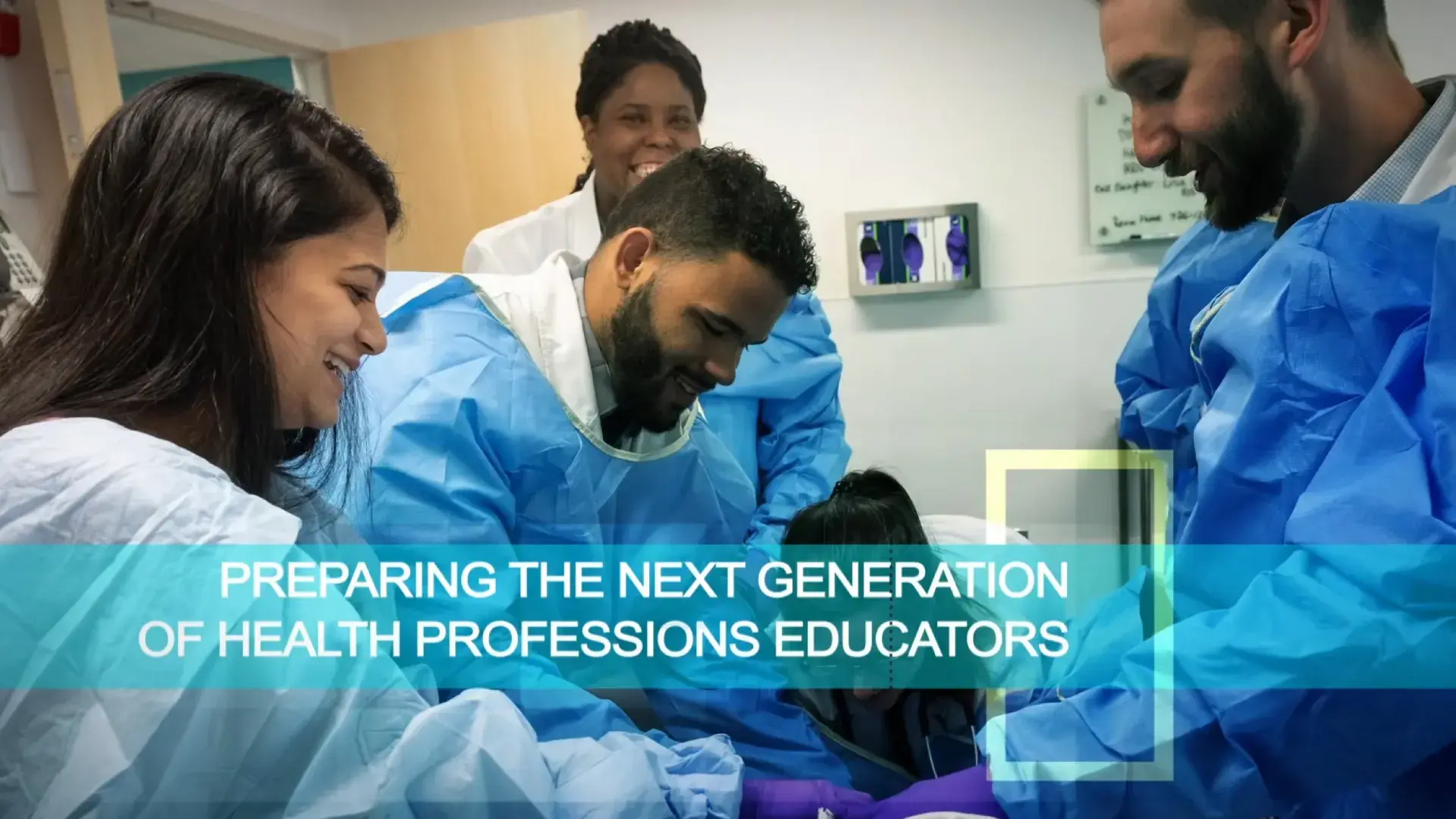 Several medical professionals wearing scrubs working with a patient