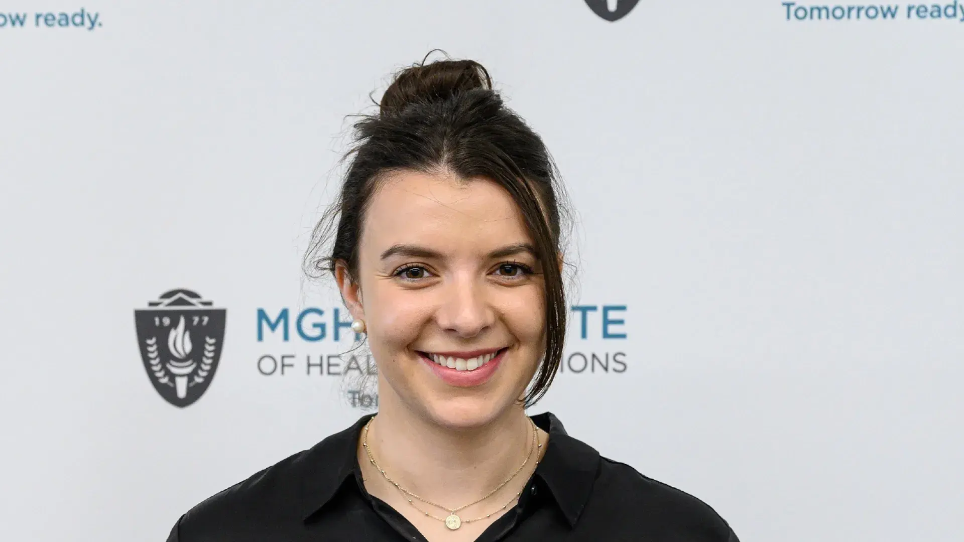 courtney holds her plaque