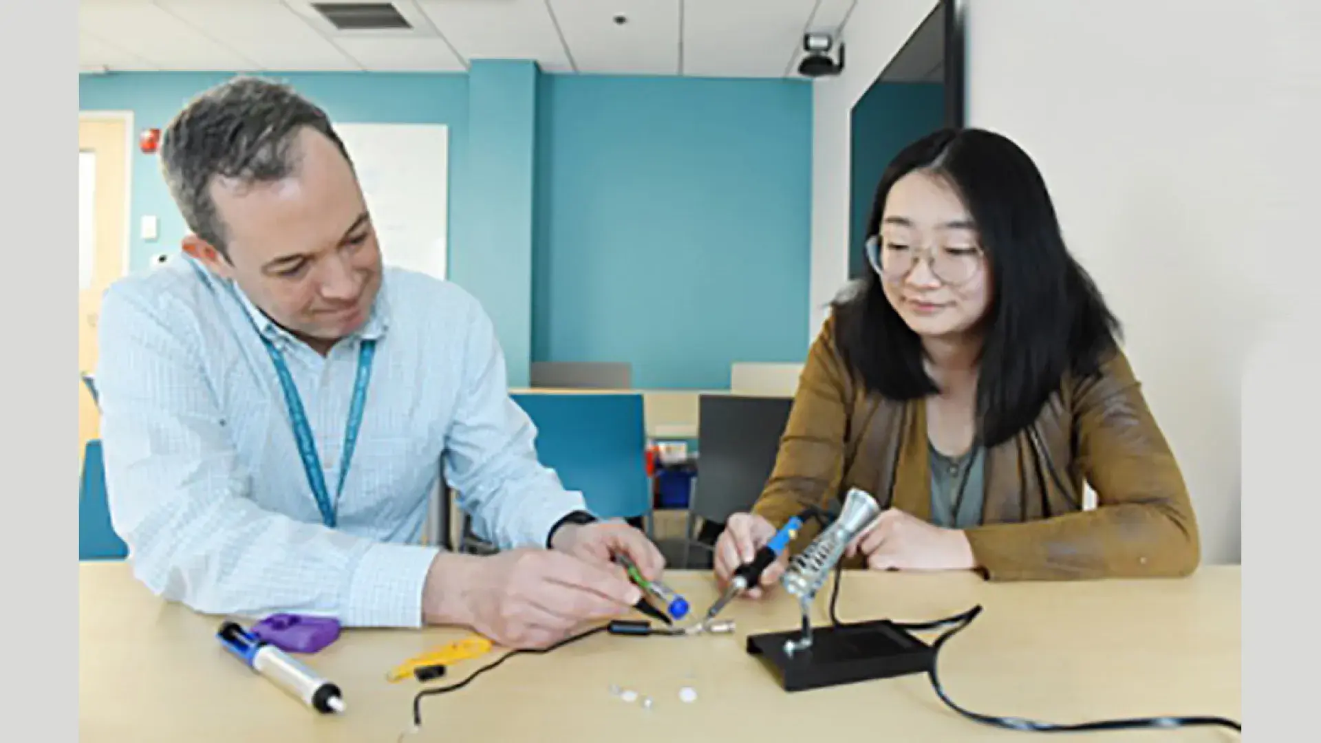 Photo of Faculty member Kevin Berner and OTD student Jiaolin Zhao