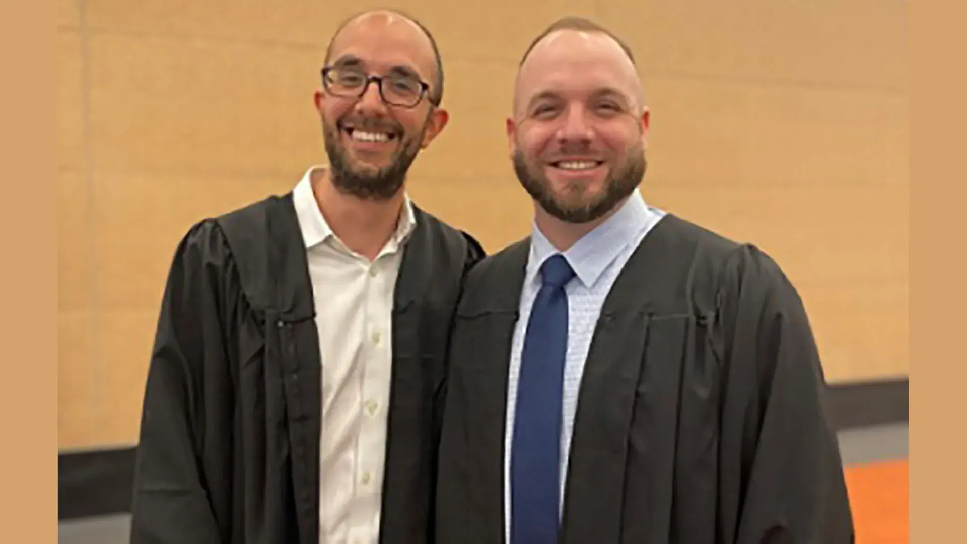 Photo of Master of Science in Nursing graduates Ben Brondsky, left, and Kevin Berney before the start of Commencement 2022.