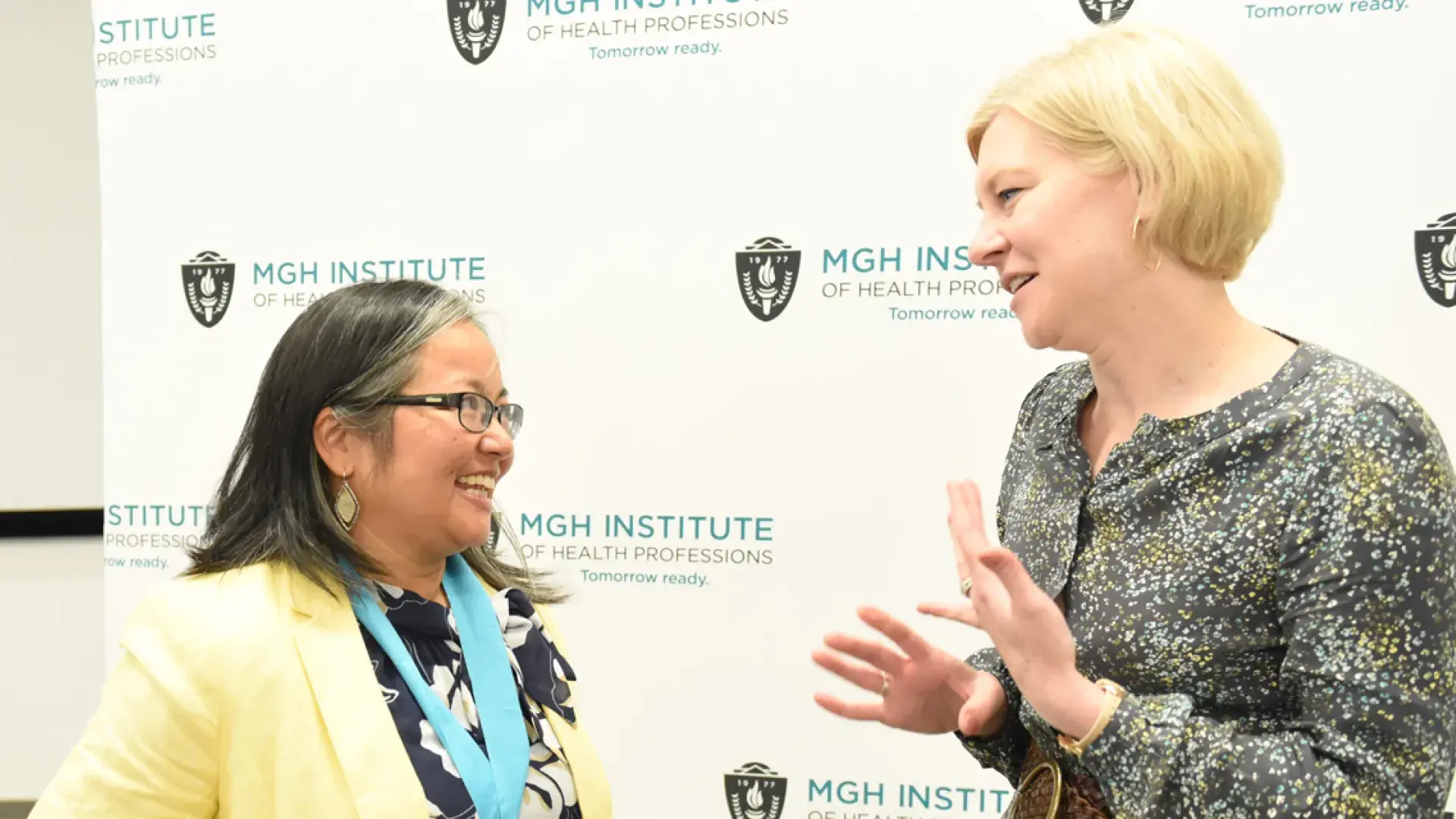 Gayun Chan-Smutko (left) talks with Genetics Counseling Chair Maureen Flynn after receiving the Nancy T. Watts Award for Excellence in Teaching.