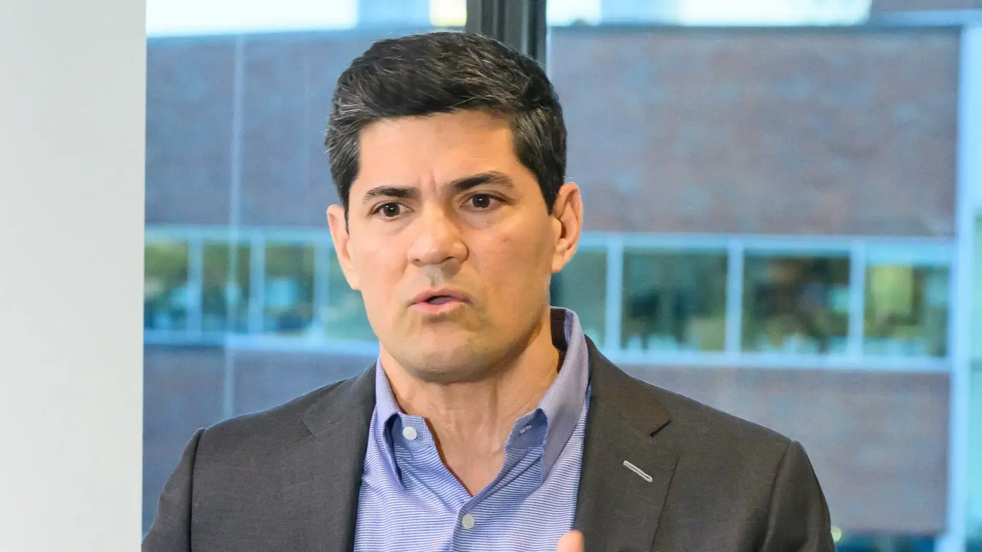 tedy speaks at podium