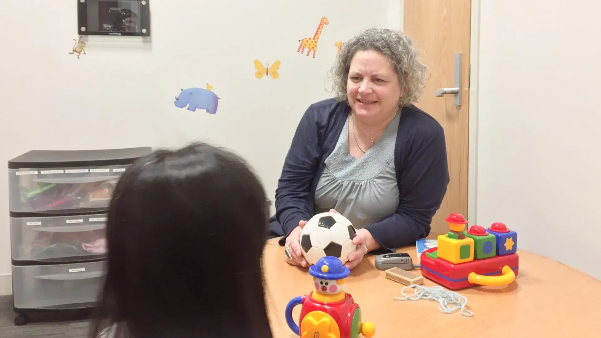 woman talking to a child