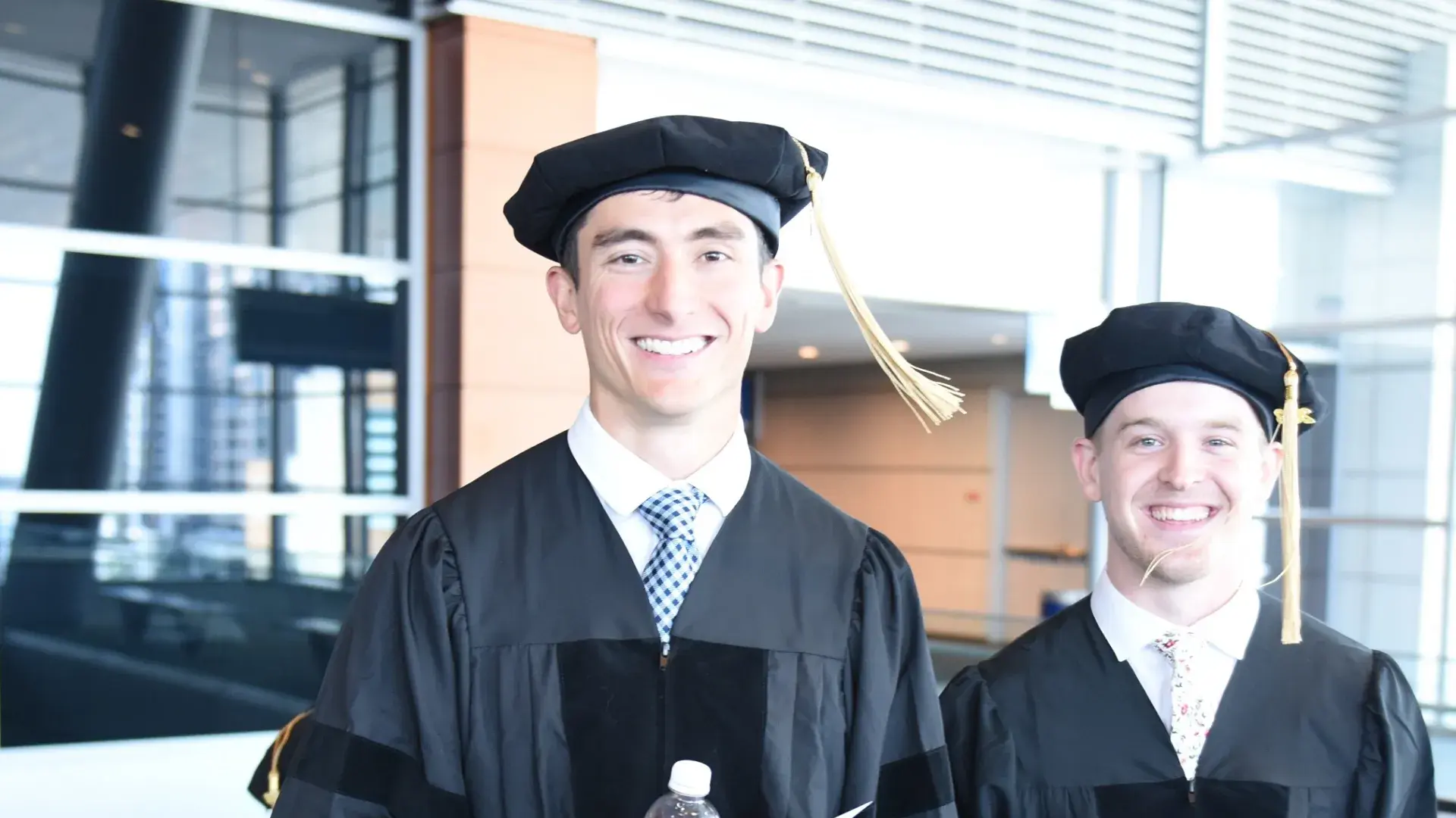 people smile on an escalator