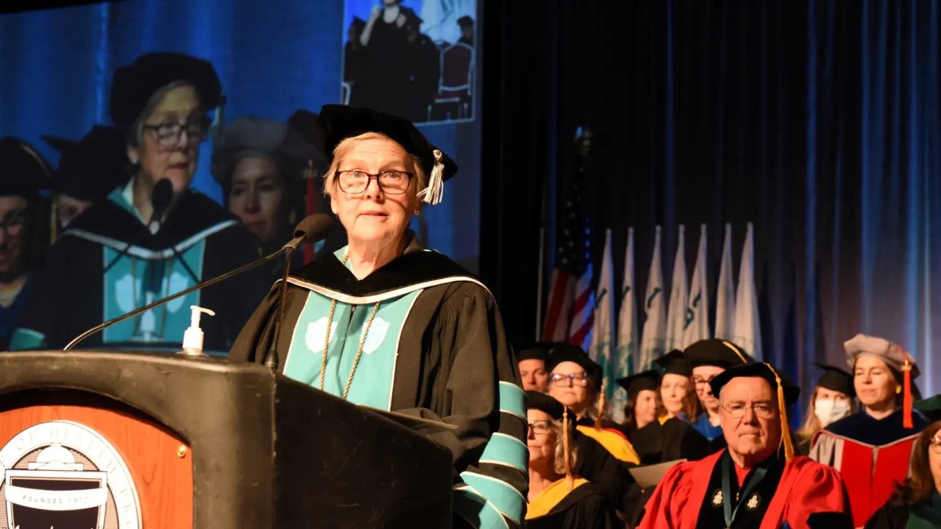  President Paula Milone-Nuzzo greets the new graduates.