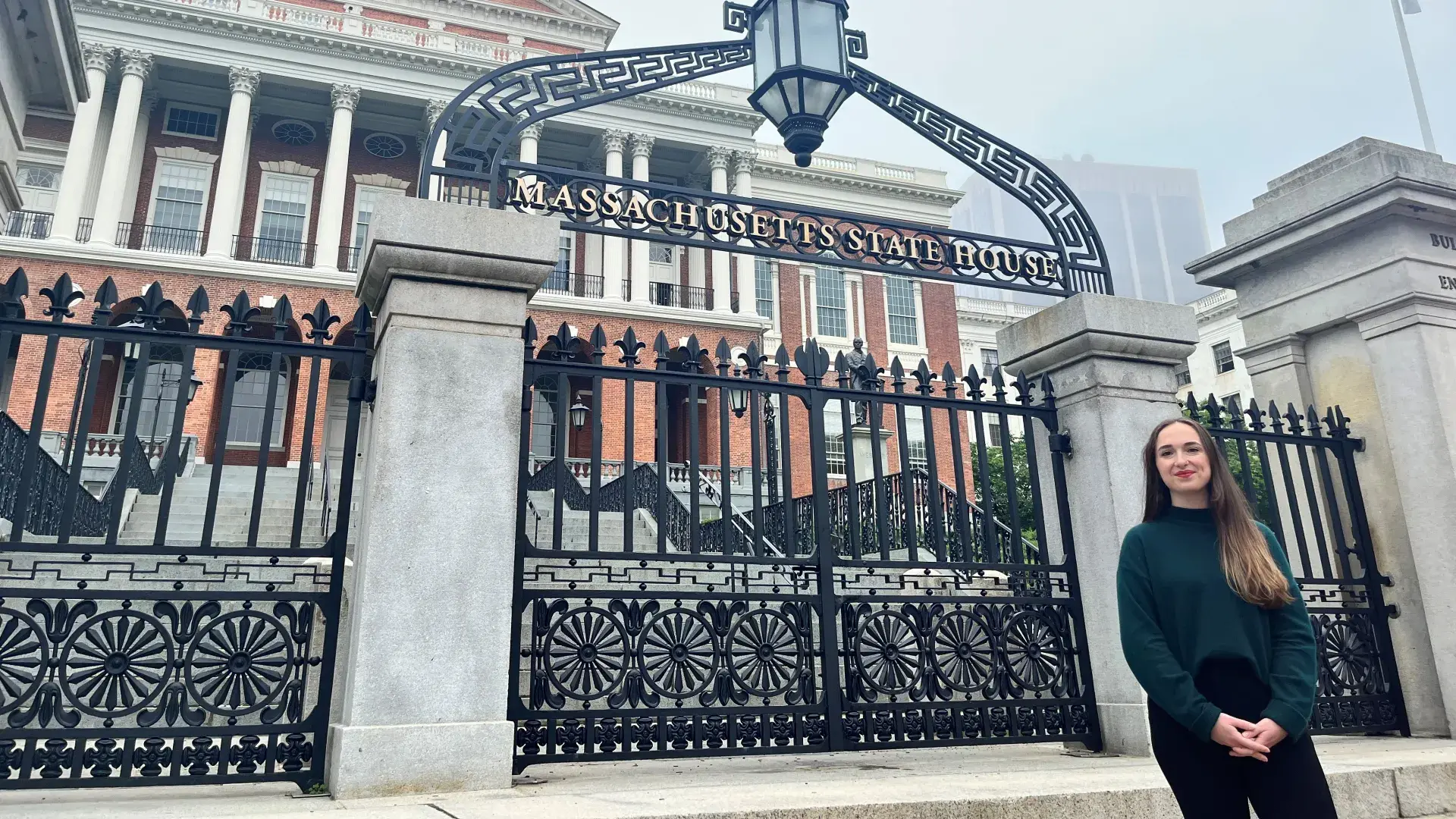 Mary O'Donnell stands in front of State House