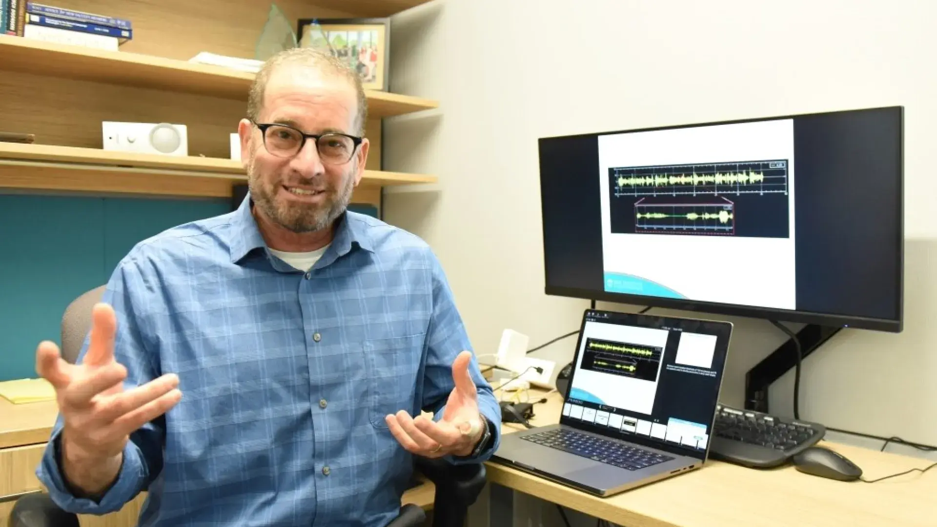 Man gesturing in an office