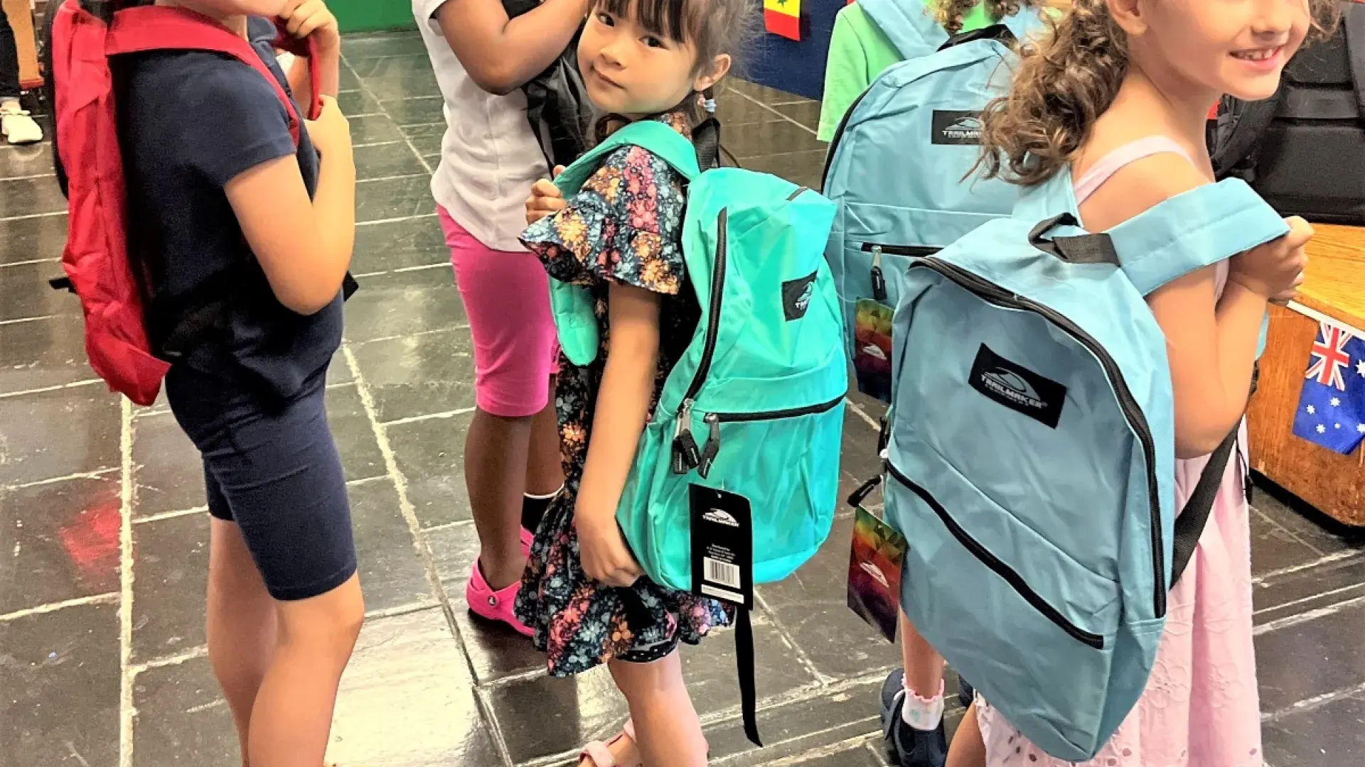 kids wearing backpacks