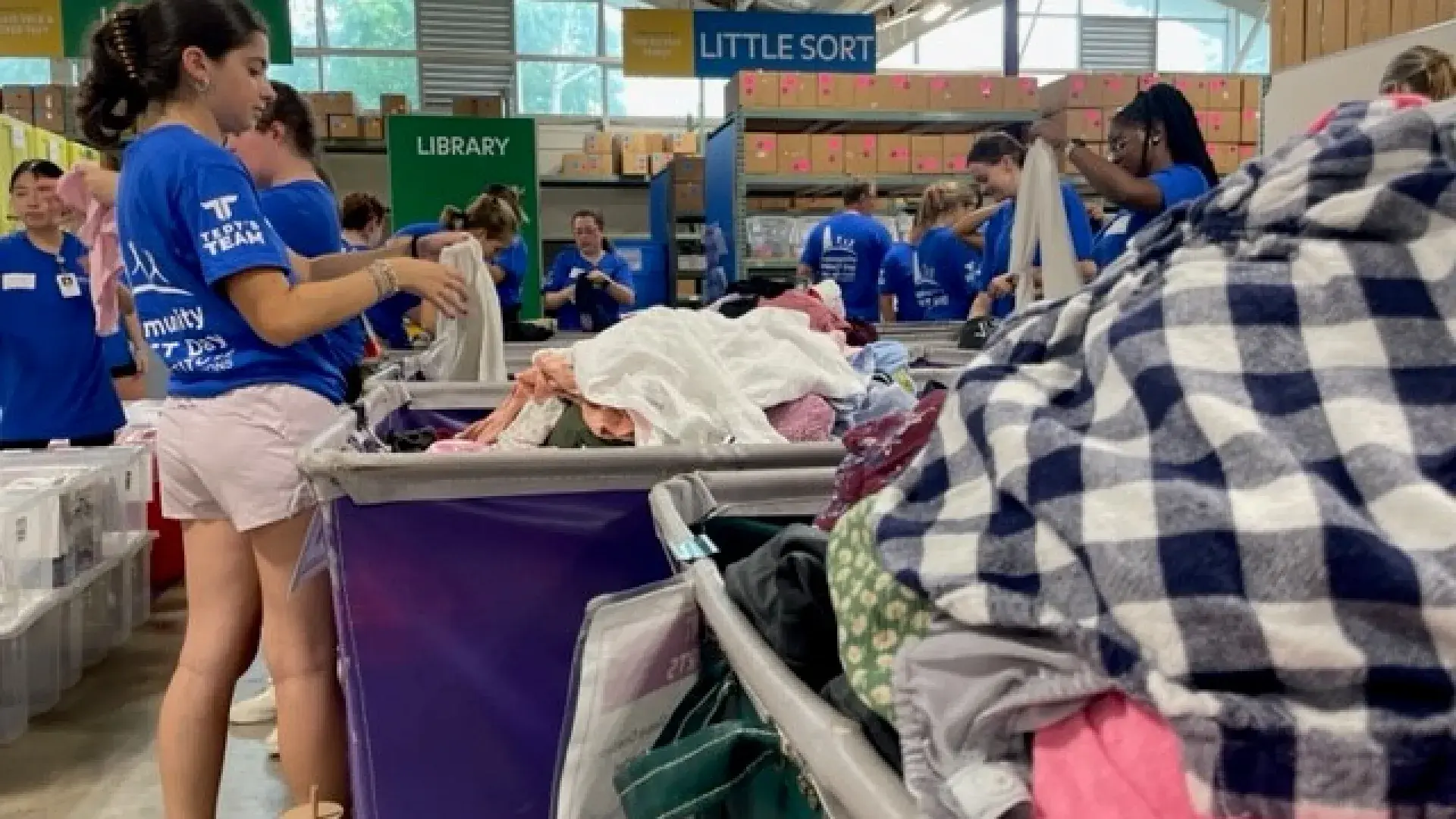 Students sorting clothing