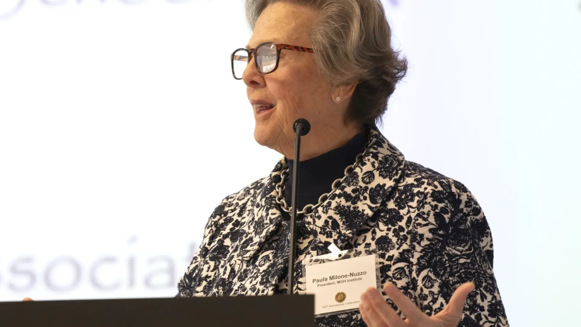 Woman in glasses talking