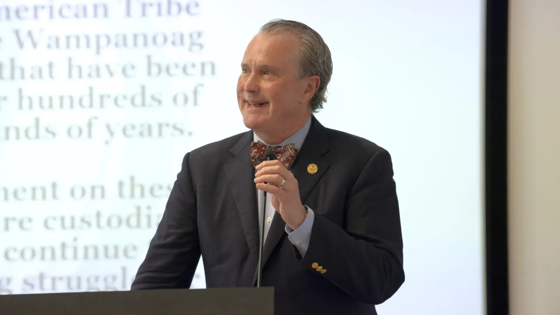 Man smiling and talking