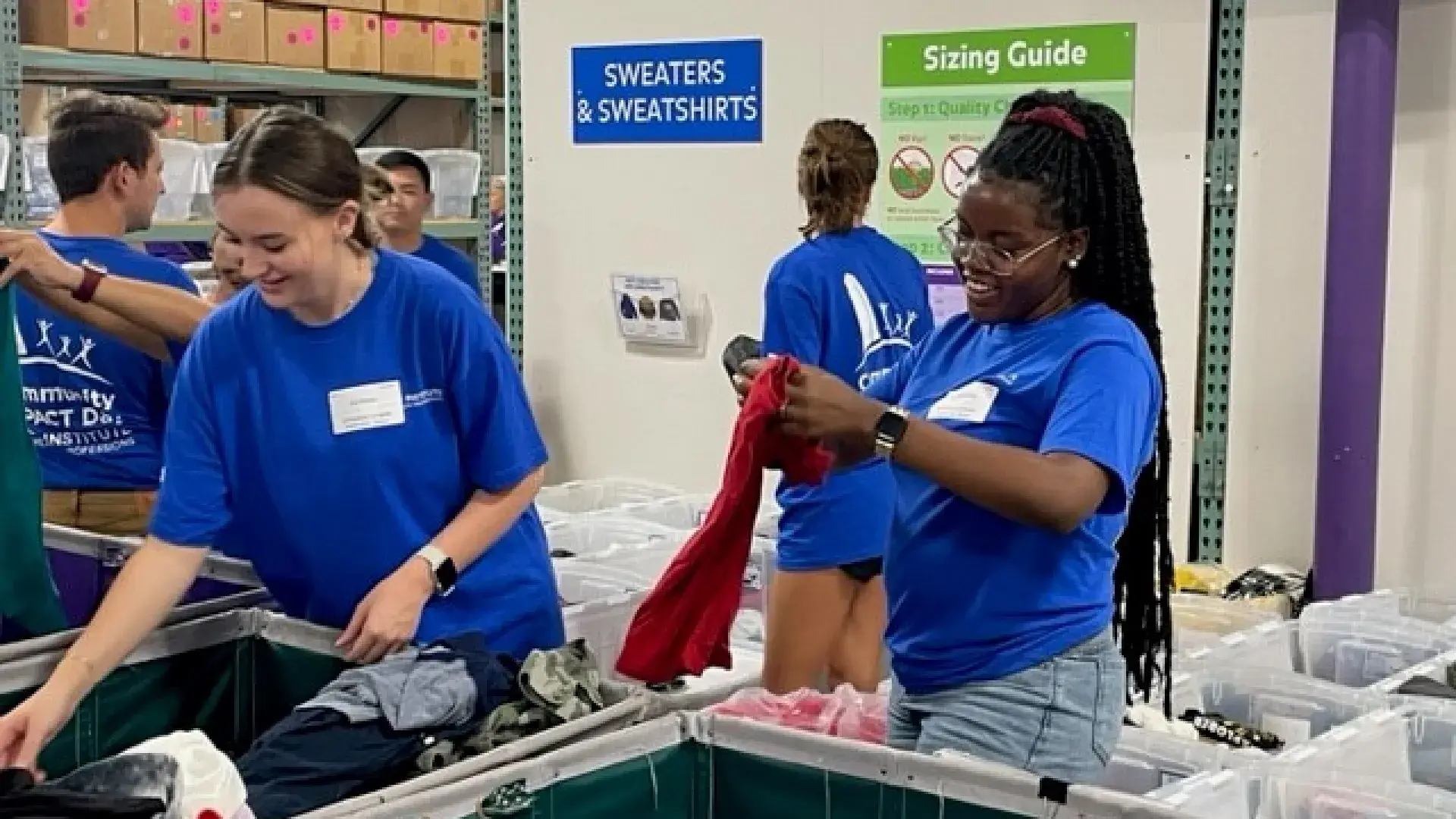 People sorting clothing