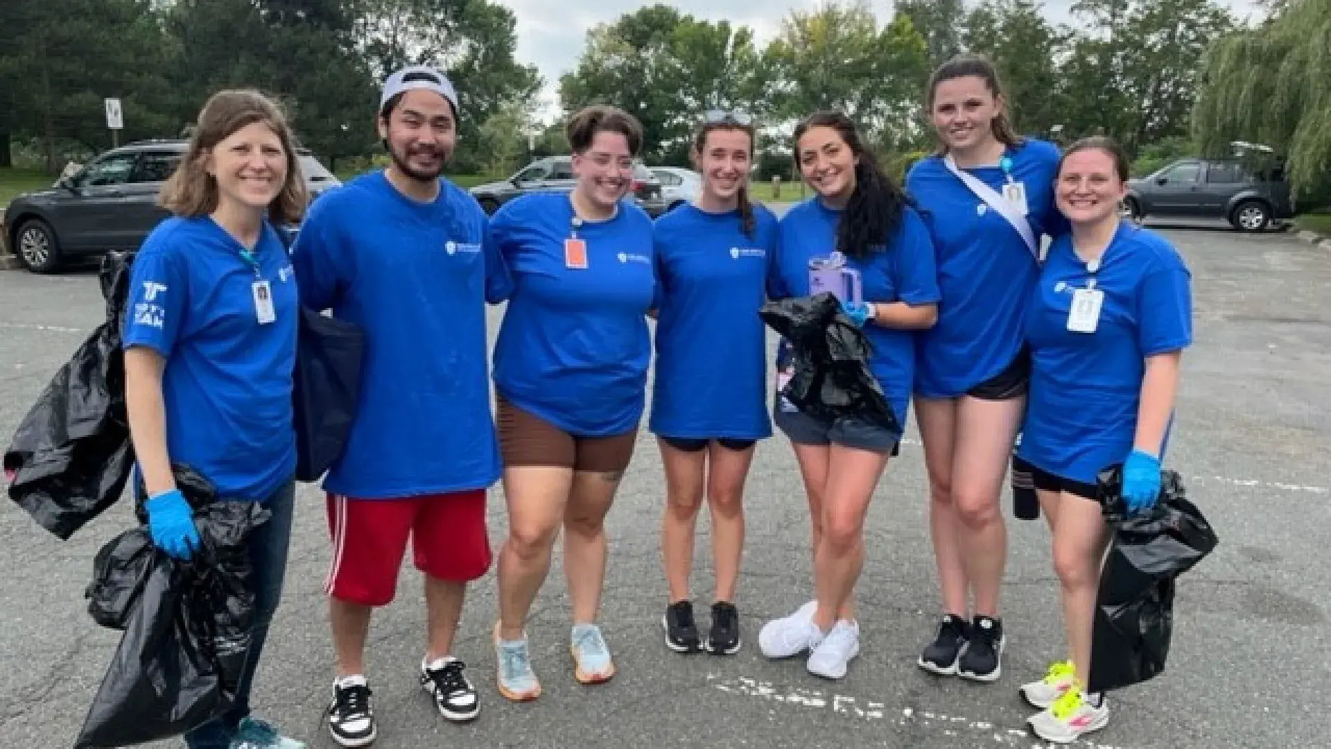 7 people posing for a photo