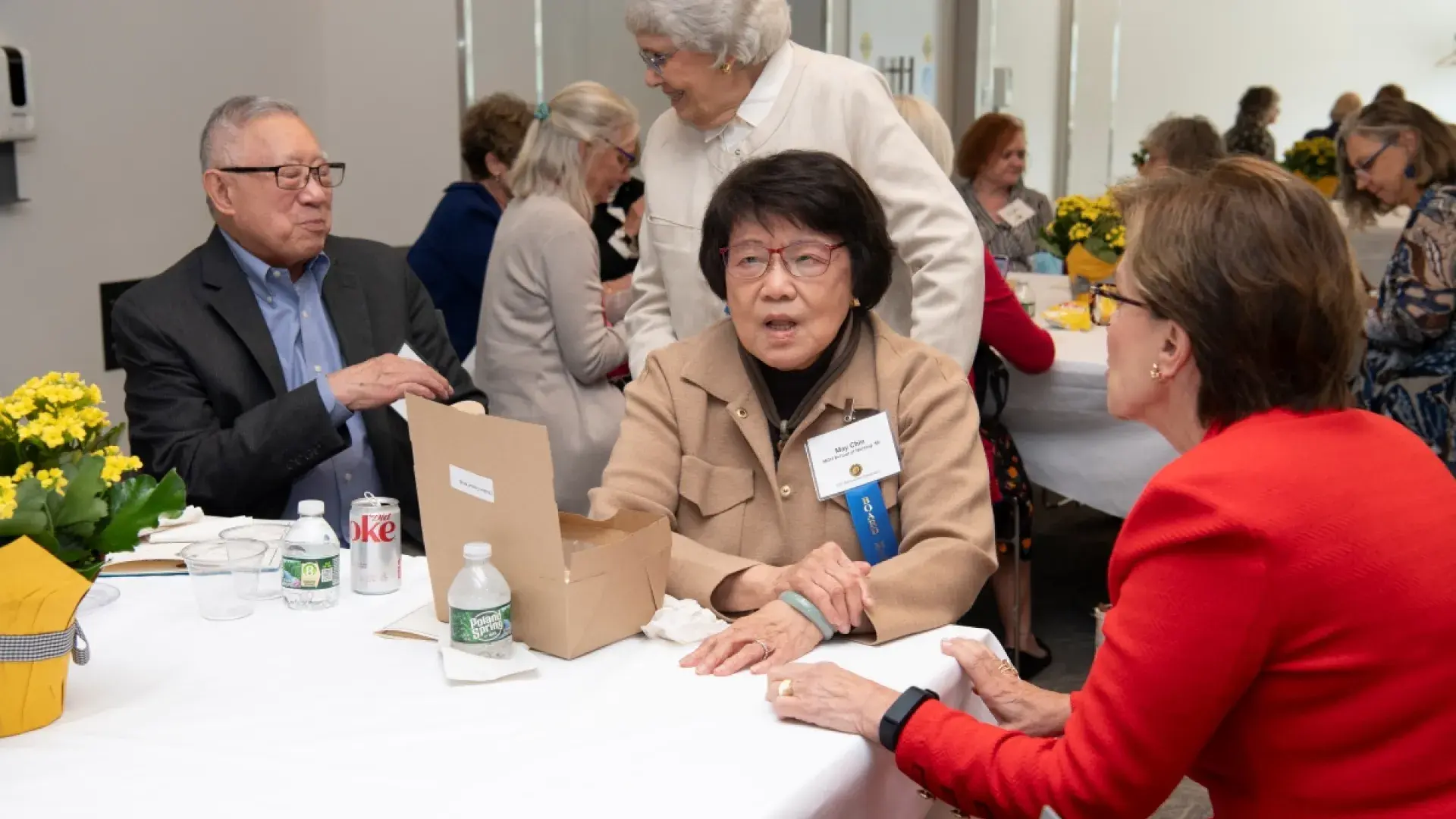 People talking at a table