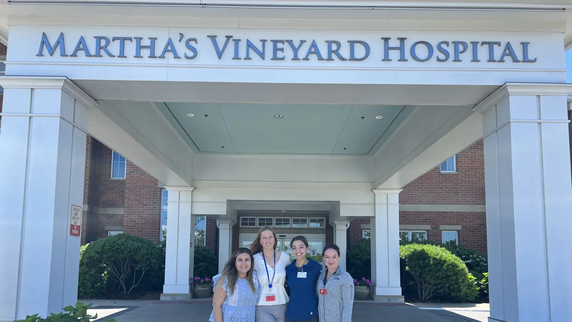 four women stand in front of Marthas Vineyard Hospital