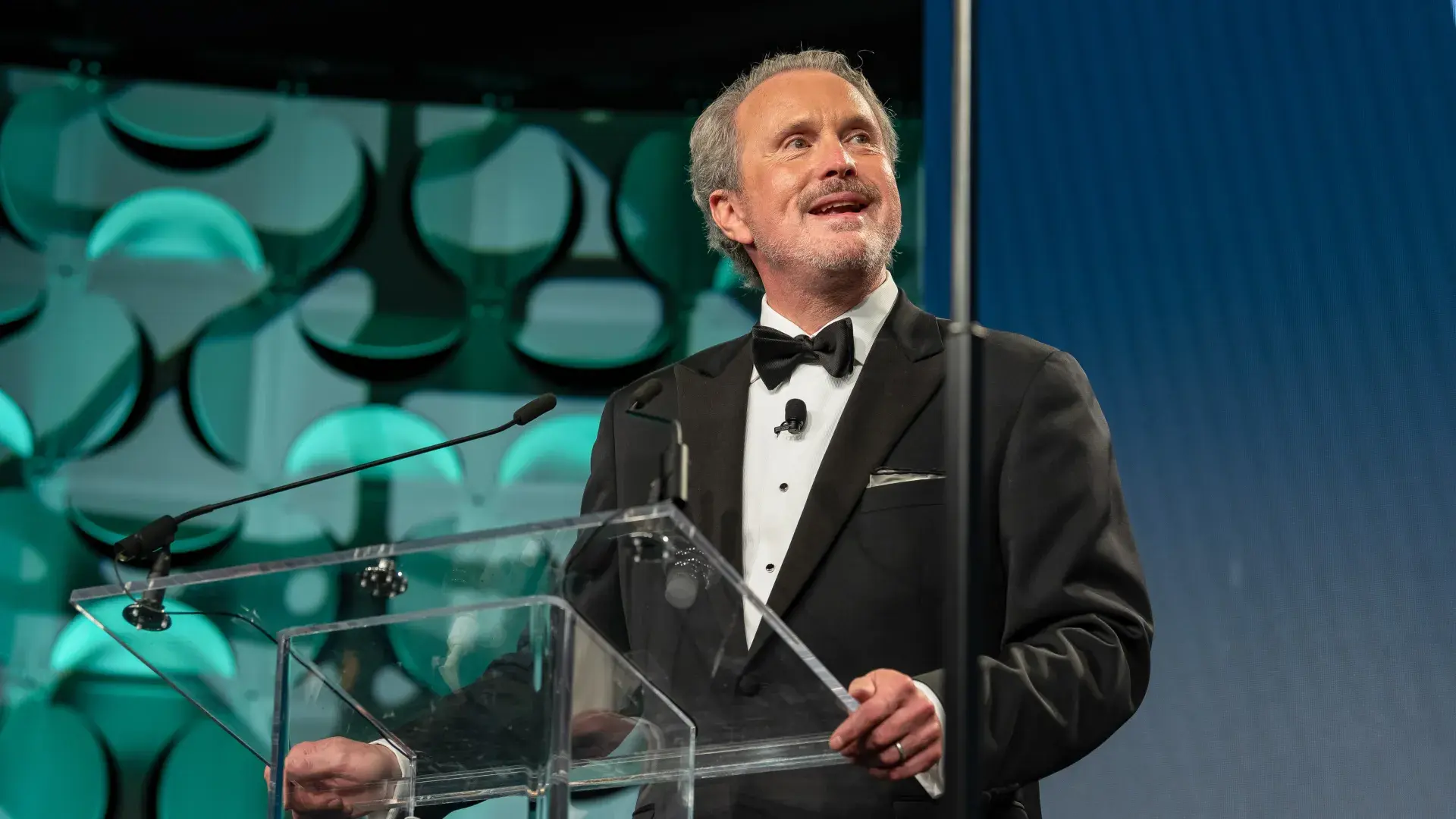 Man speaking at podium