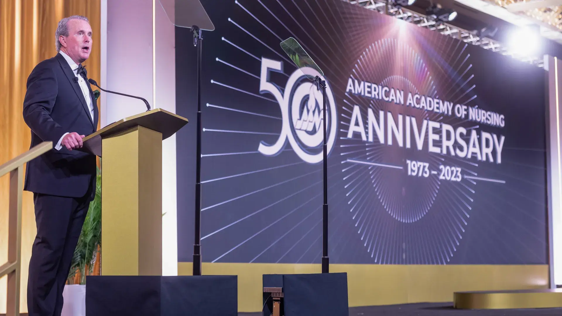 Man speaking at podium