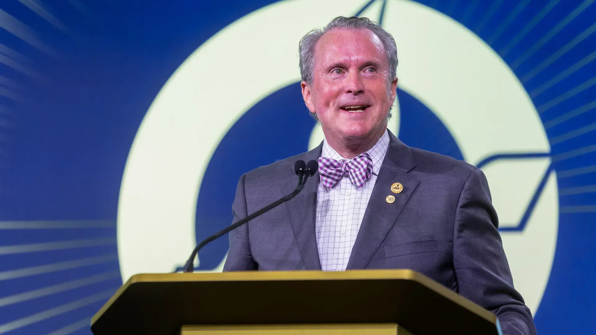 Man speaking at podium