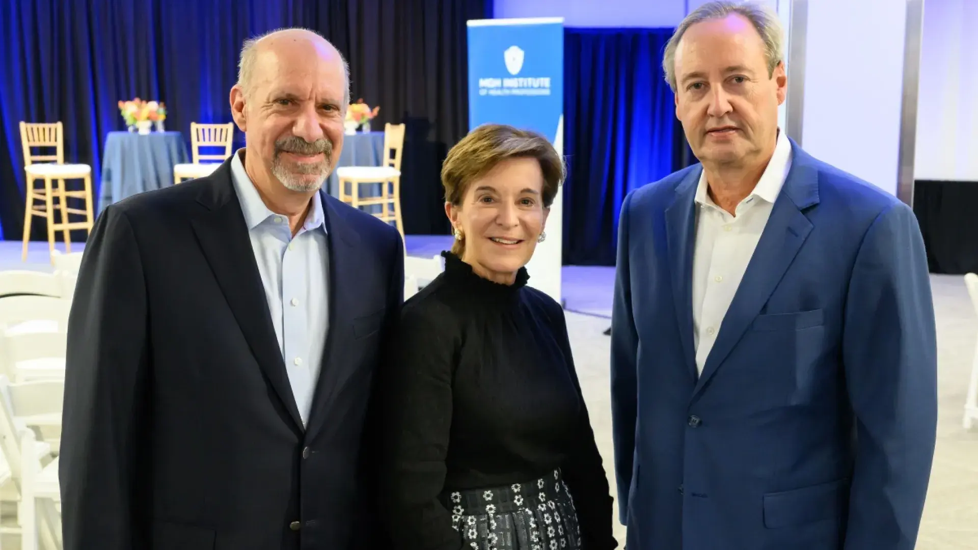 Woman flanked by two men