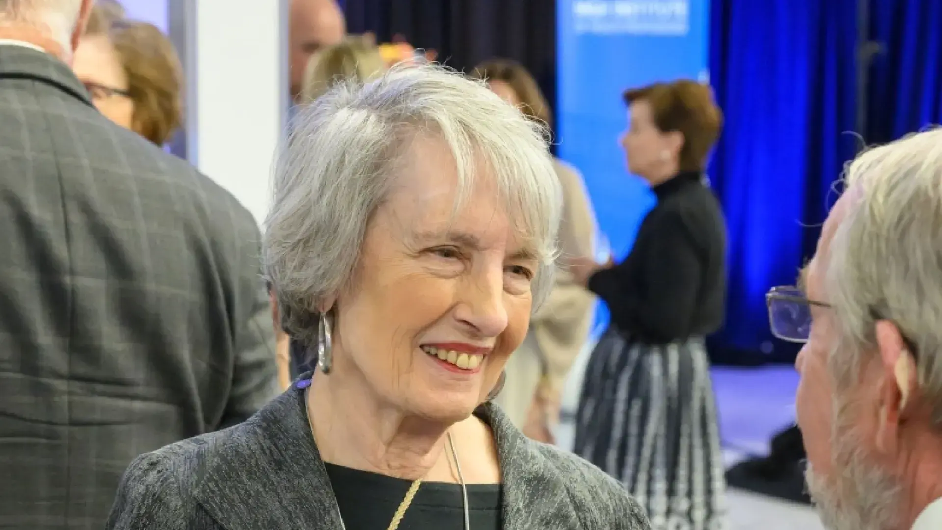 Woman talking to a man