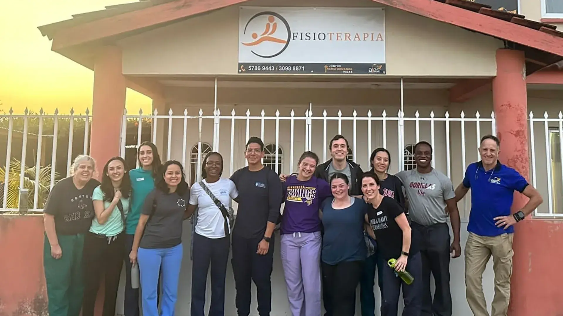 People standing outside in front of a building