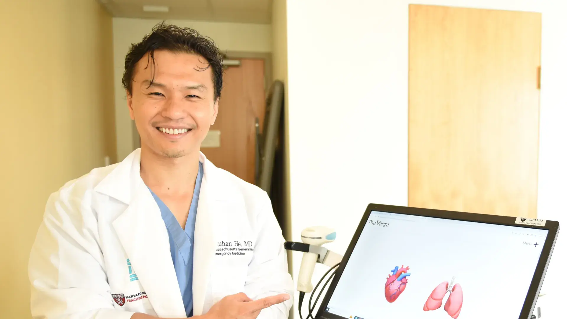 Man pointing at laptop