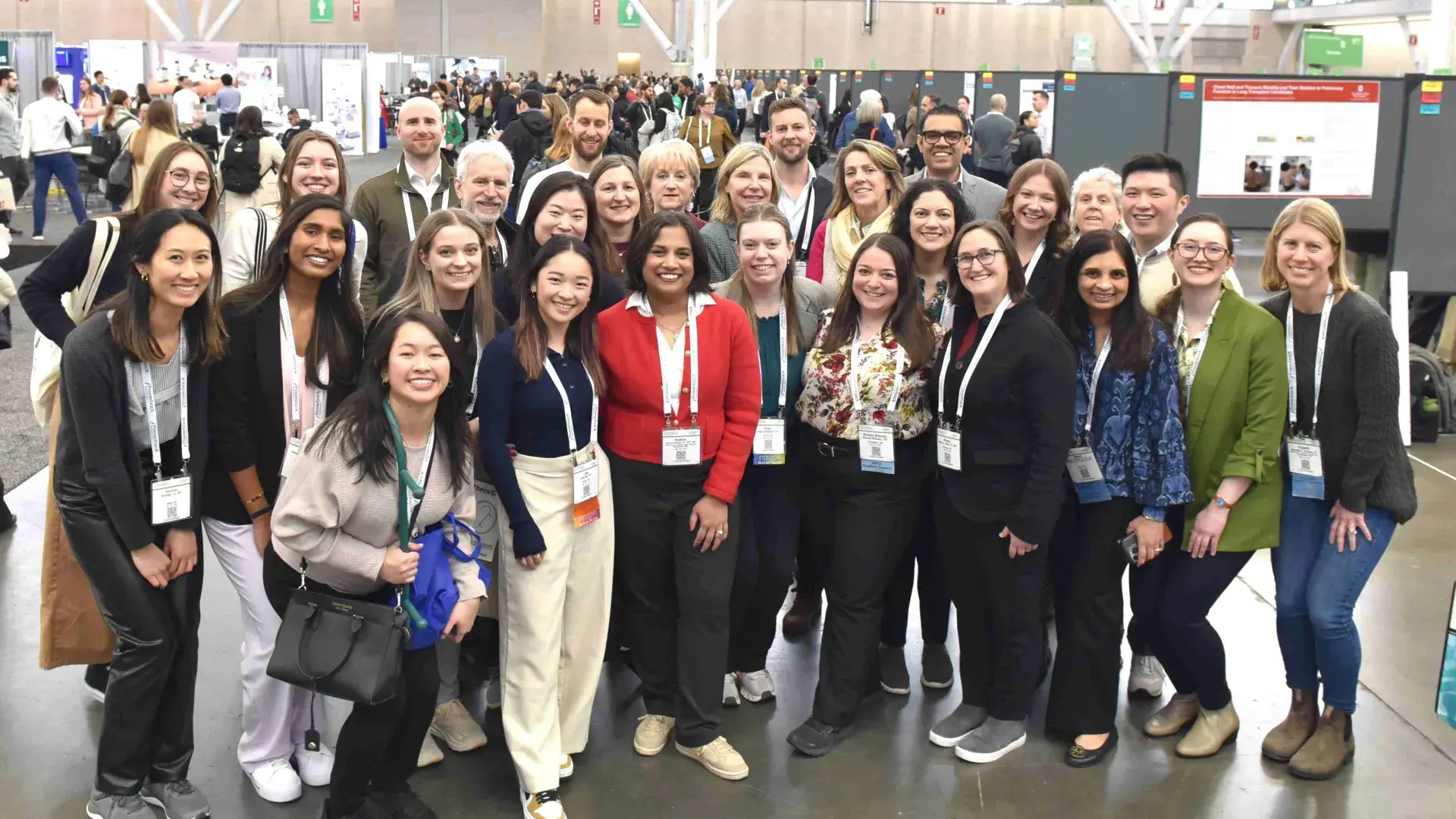Group of people pose for photo