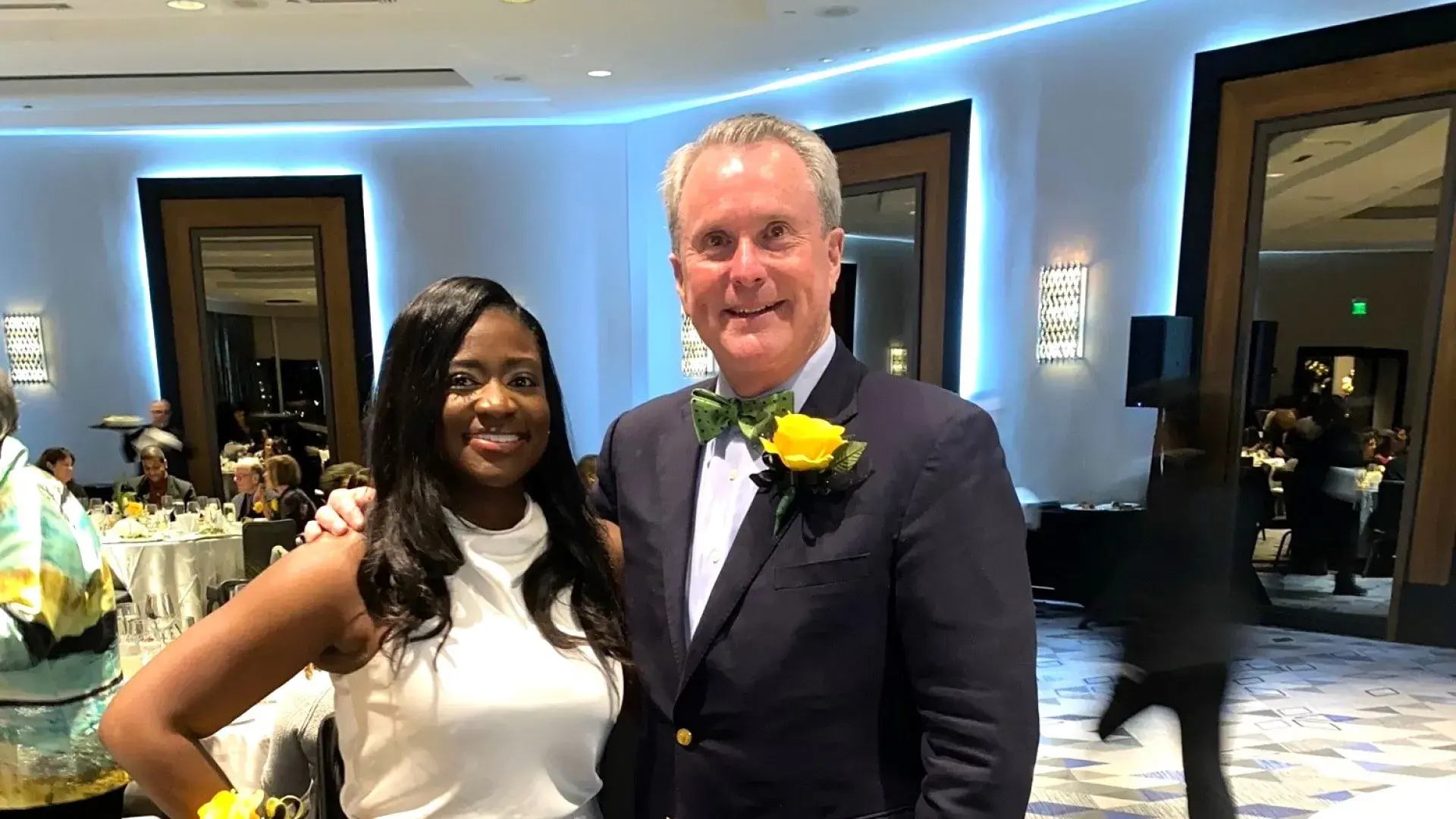 Woman and man pose for a photo