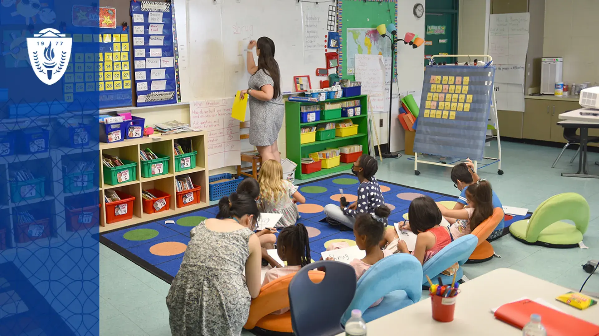 A reading specialist helps children learn language skills