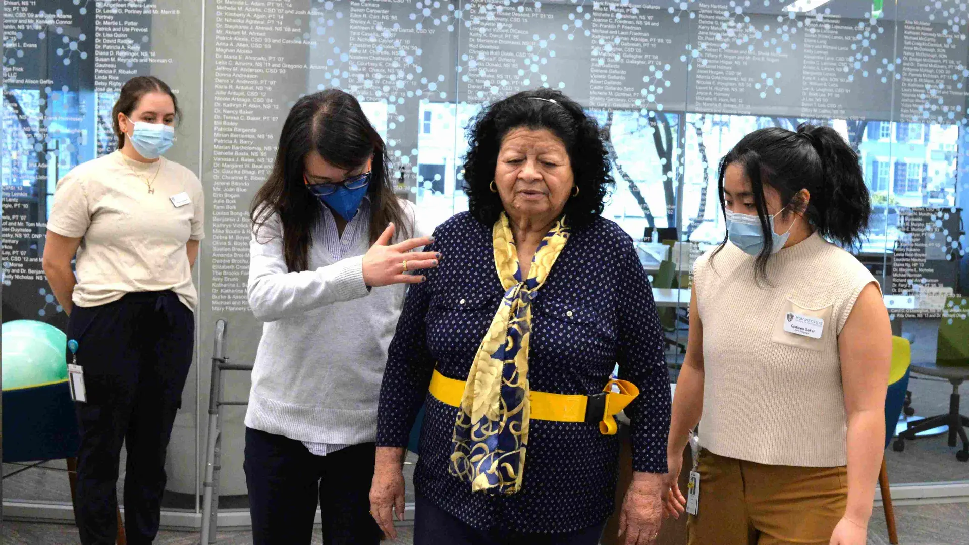 Students assisting a client