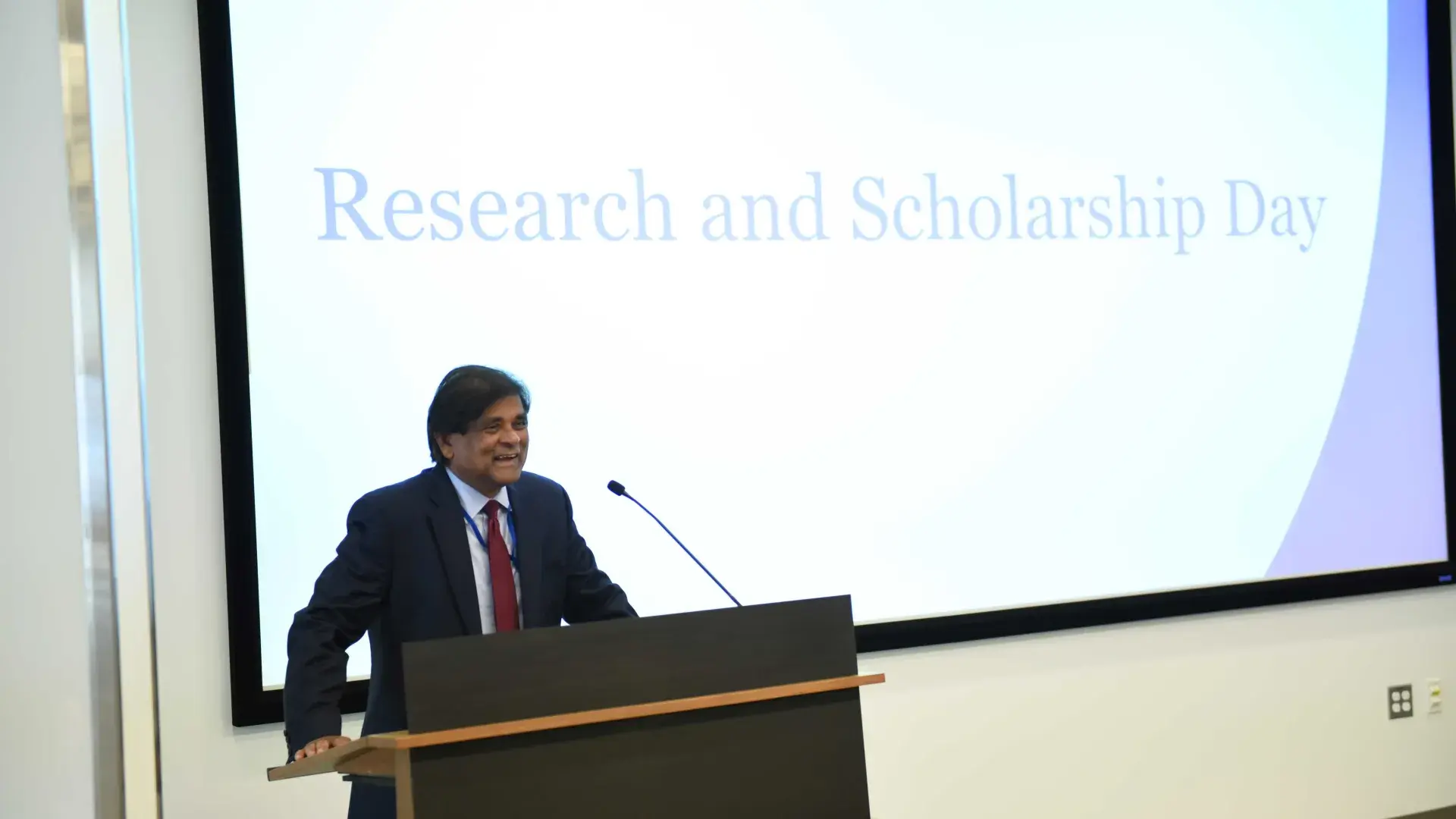 Man speaking at podium