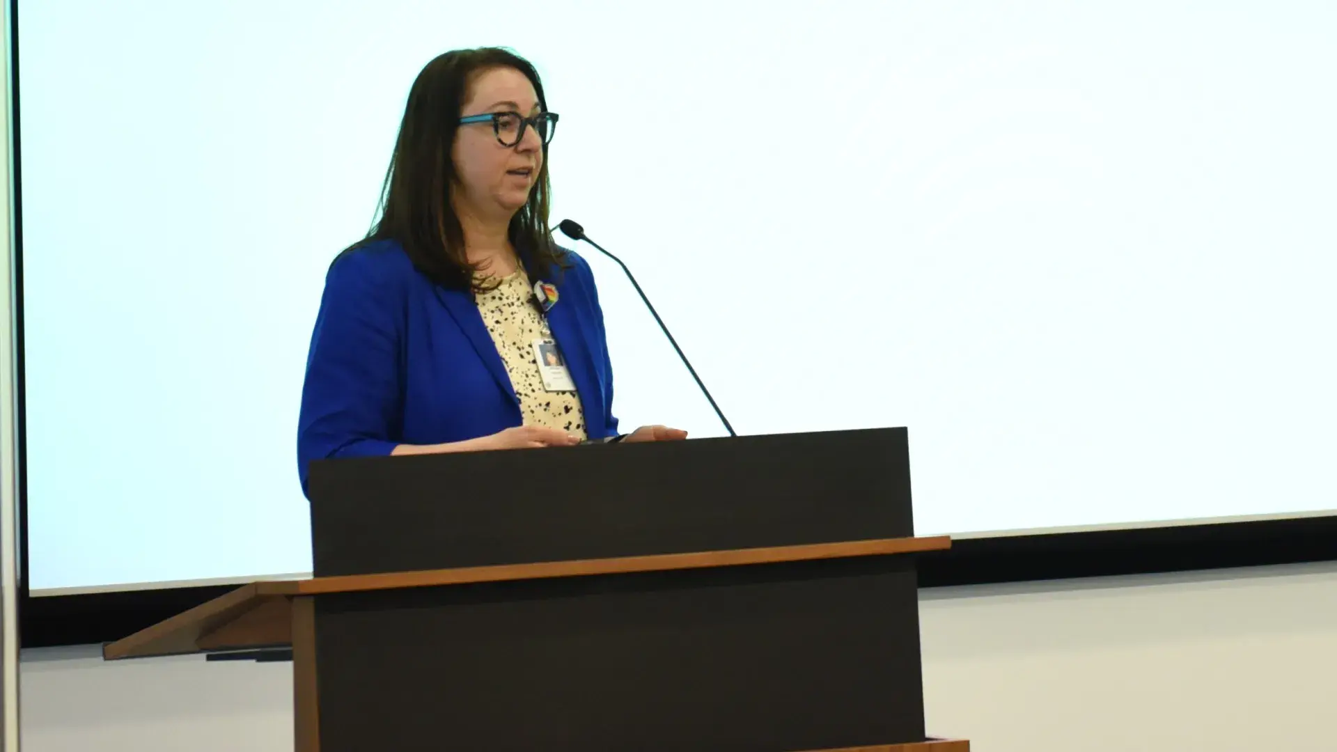 Woman speaking at podium