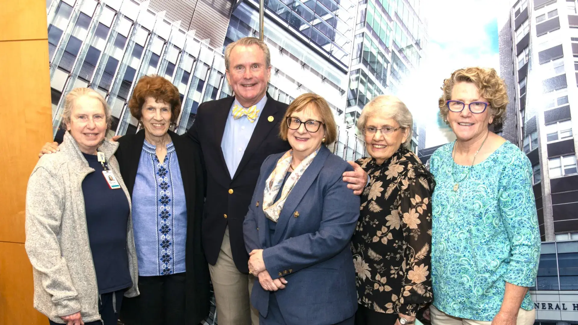 6 people pose for photo