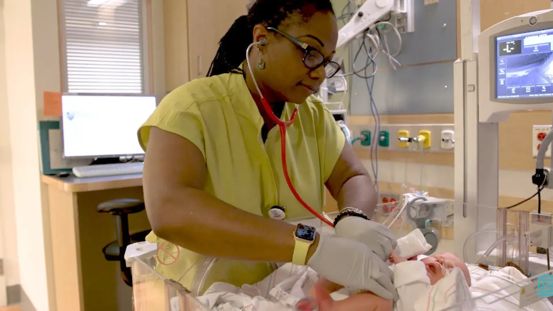 A student nurse in the MGH IHP Fast-Track BSN Program performing a newborn assessment as part of the accelerated nursing curriculum. This intensive nursing training focuses on preparing students for nursing licensure through hands-on experiences in a high-paced clinical environment.