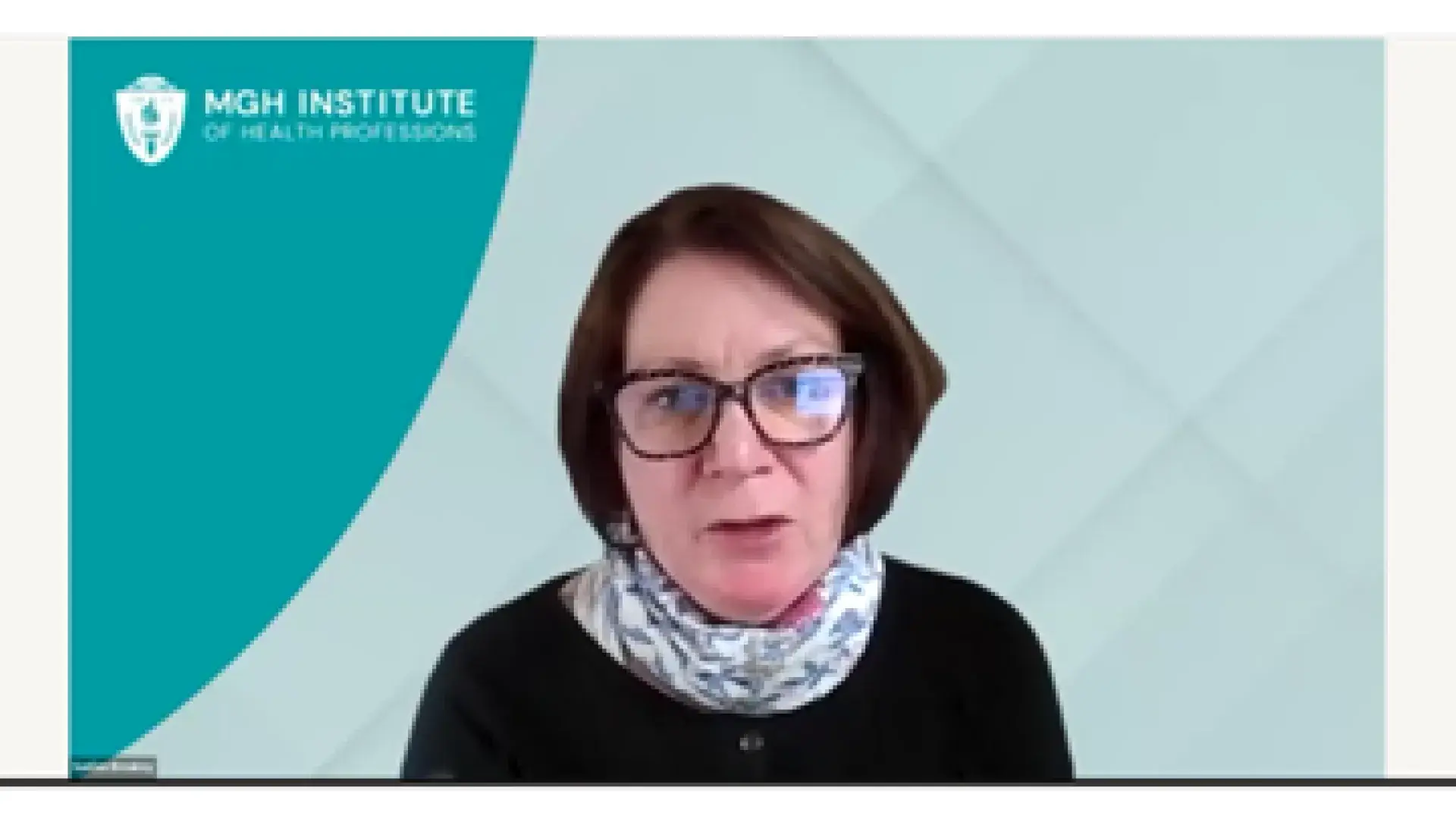 Woman in glasses talking on Zoom